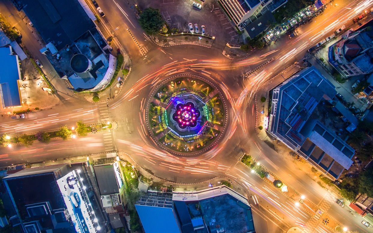 aerial view of roundabout at night time with cars