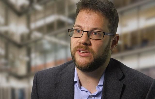 Screen shot of video featuring Jonathan Gardner senior economist discussing retirement security