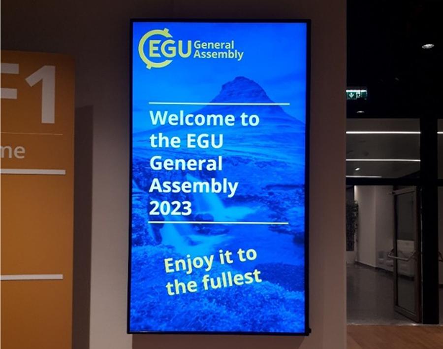 Photo of billboard lit up with sign welcome to the egu  general assembly  2023 enjoy fullest