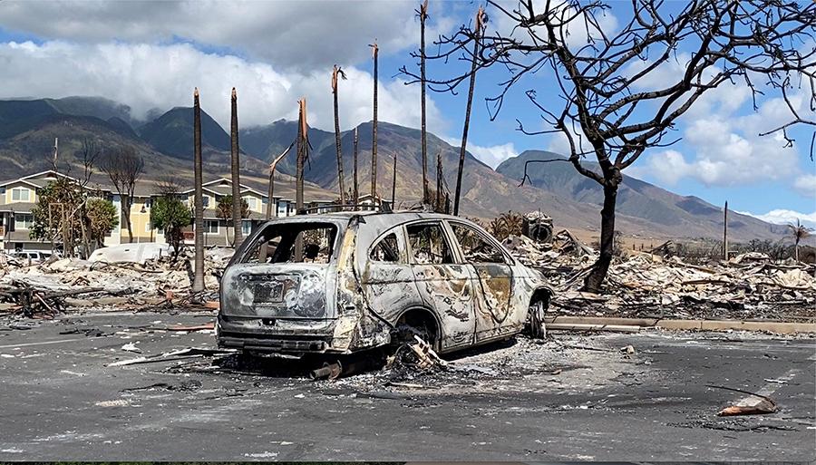 Photo taken with a mobile phone on Aug. 14, 2023 shows a vehicle destroyed in a wildfire in Lahaina town.