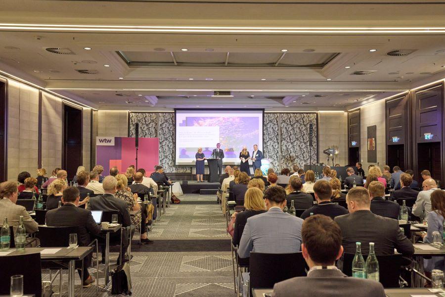 Vier Expert:innen diskutieren auf dem Willis Risk Summit 2025 in einem Dialog die Auswirkungen geopolitischer Ereignisse auf den Export und deren Einfluss auf die Konzernbilanz.