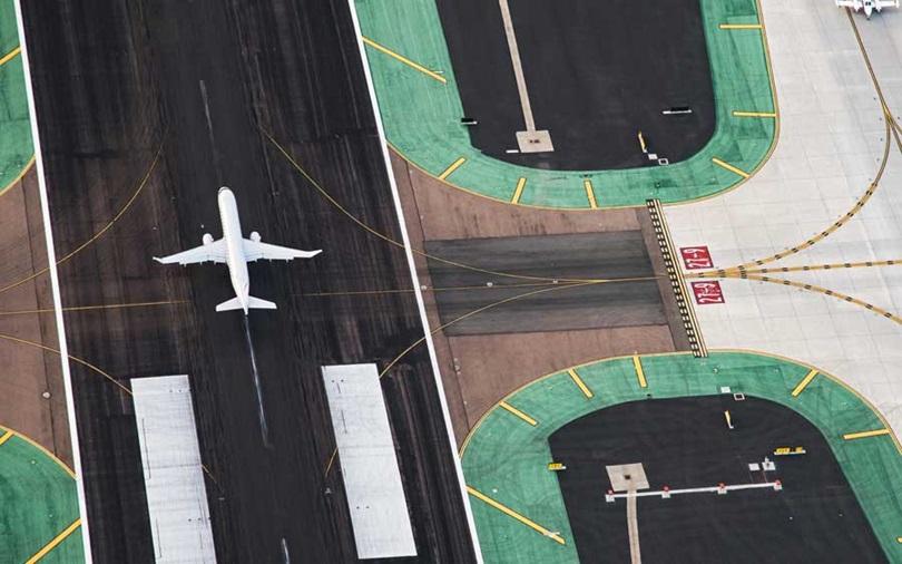 Aerial view of an aircraft on a runway